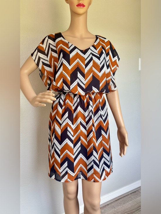 Charming Charlie Dresses & Skirts - Charming Charlie Chevron Print Mini Dress in Rust, Black & White